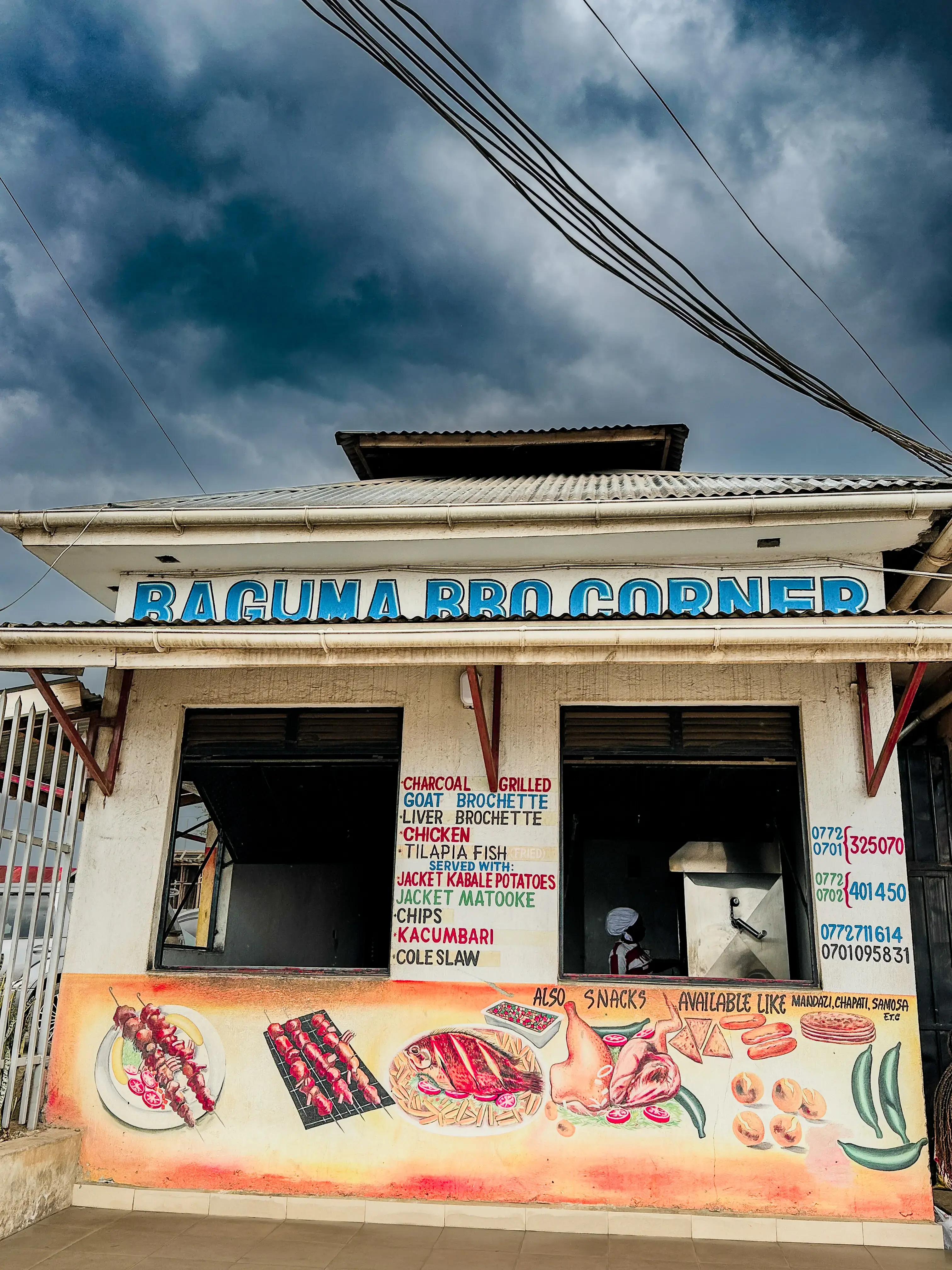 Outdoor BBQ restaurant at Baguma Hotel in Mbarara